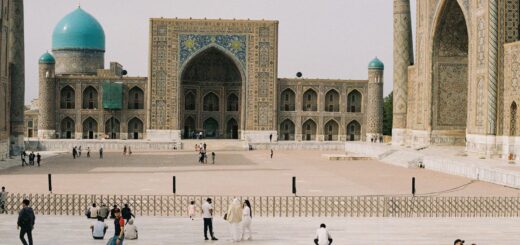 a group of people standing in front of a building